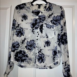 Forever 21 blue and black floral long sleeve blouse, size small.
